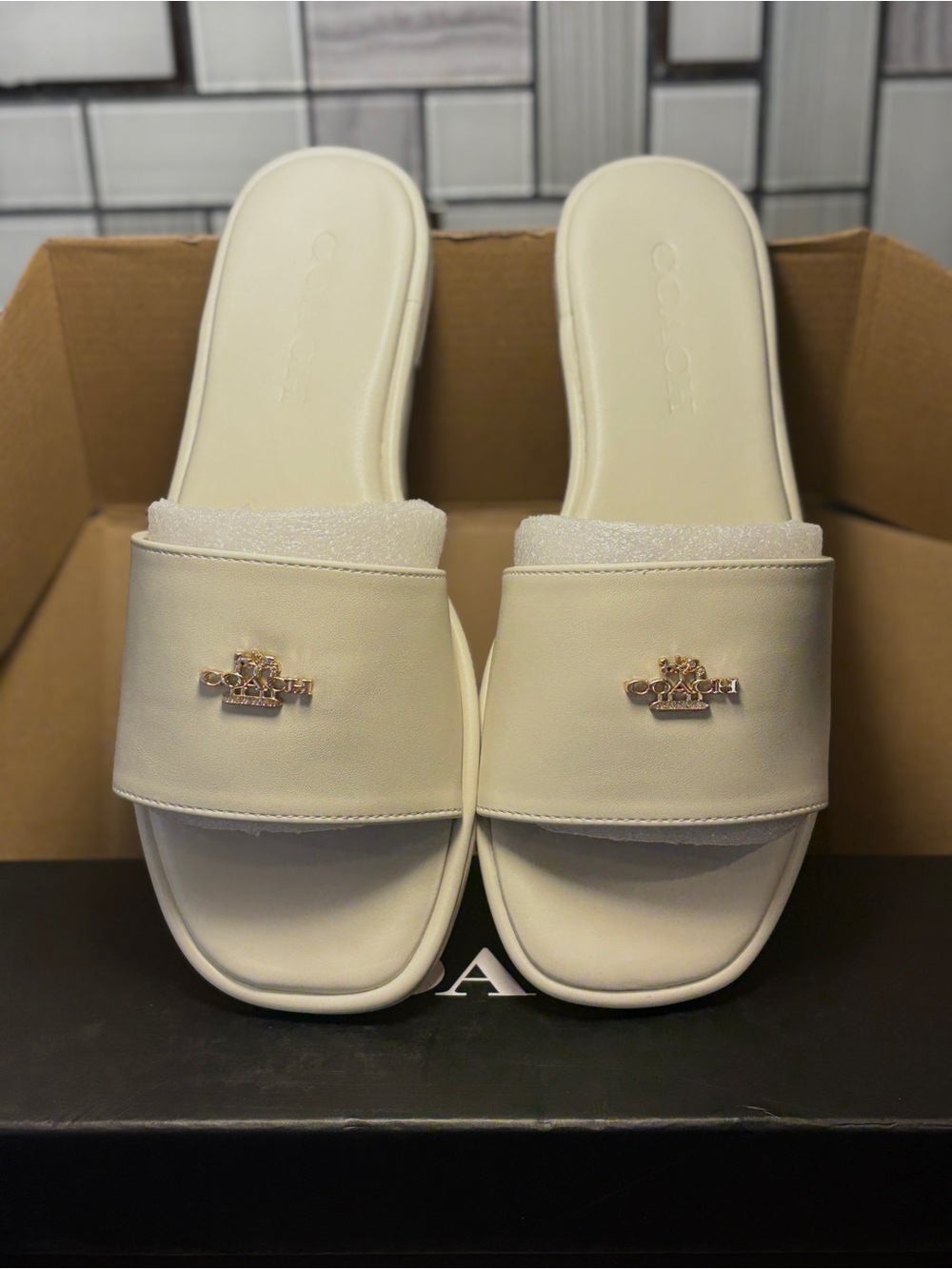 Coach Ivory Slide Sandals with Gold Emblem - Picture 2 of 4